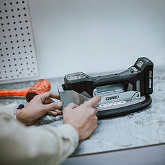 GRABO Impact Plate — official product/application photo 13. Consult the listed package contents; demonstration tools and surfaces are not part of the accessory.