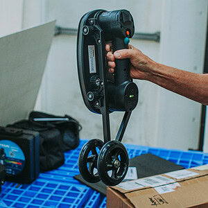 GRABO Roller Transport Attachment — official product/application photo 10. Consult the listed package contents; demonstration tools and surfaces are not part of the accessory.
