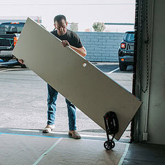 GRABO Roller Transport Attachment — official product/application photo 9. Consult the listed package contents; demonstration tools and surfaces are not part of the accessory.